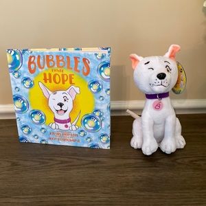 New hardcover book & new plush toy. Will not separate.